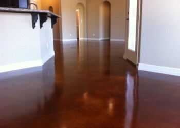 Finished acid-stained concrete floor in a home in Euless, Texas. Interior view of a polished concrete floor in a residential home in Euless, Texas.