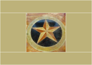 Decorative star design on concrete floor in a commercial space. Concrete floor with a star design in black, yellow, and orange colors.