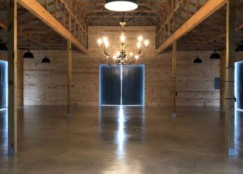 Finished concrete floor with sealing and waxing in a rustic Eads, Colorado building. Interior of a newly sealed and waxed concrete floor in a rustic barn-style building in Eads, Colorado.