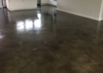 Concrete floor with acid stain finish in a kitchen in Ephrata, Pennsylvania. Interior view of a concrete floor with acid stain finish in a modern kitchen.