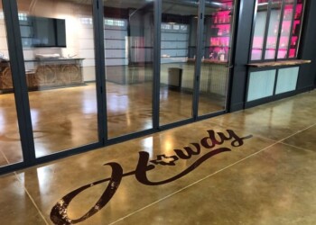 Custom engraved logo on polished concrete floor at ECD Concrete in Wauwatosa. Custom engraved logo on polished concrete floor at ECD Concrete in Wauwatosa.