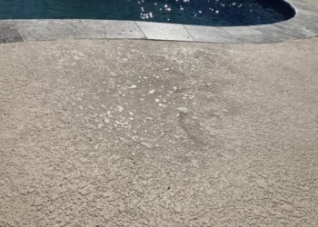 Spray cool deck surface near a pool in Temecula, showing textured finish. Close-up of textured spray cool deck surface near a pool in Temecula.