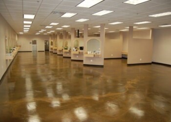 Newly finished commercial space with polished concrete floors in a business in Ephrata. Empty commercial space with polished concrete floors and beige walls.